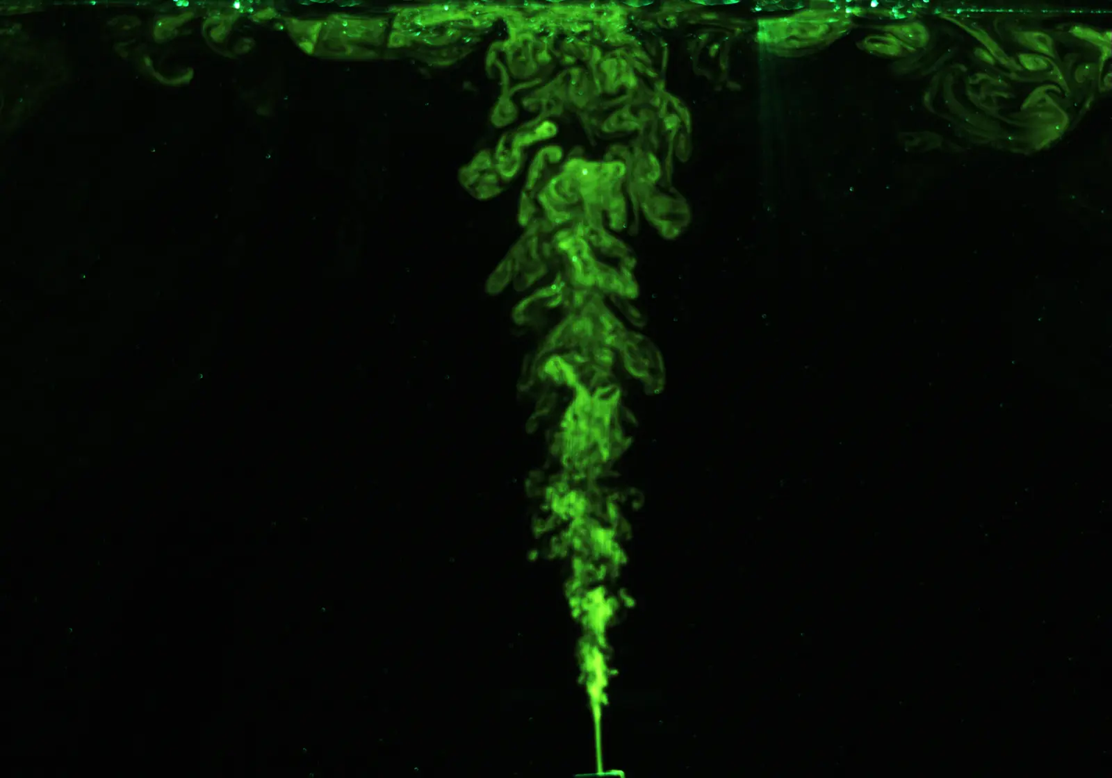 Fluorescent dye showing a plume and mixing layers in a laboratory tank